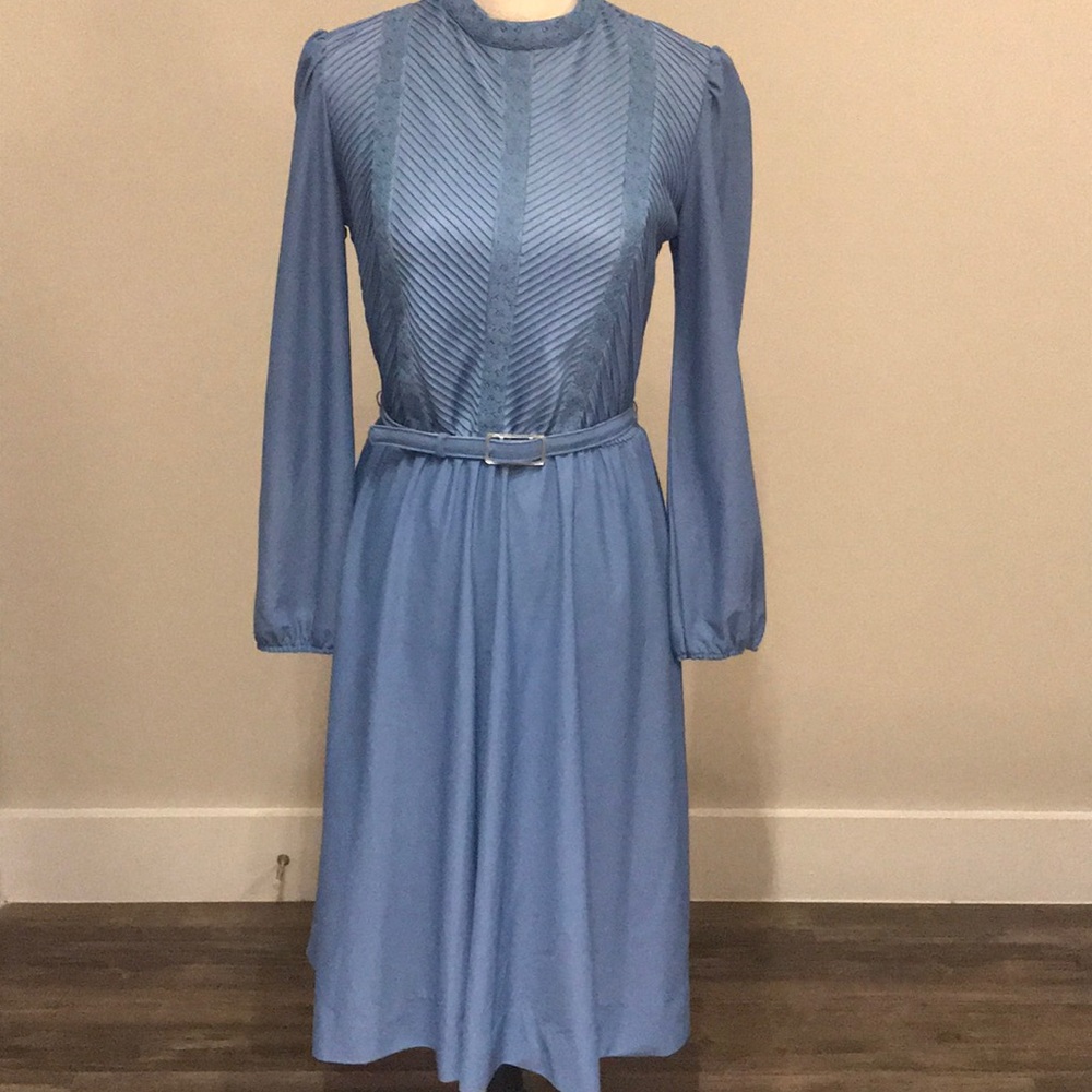 A mid length long sleeve blue dress